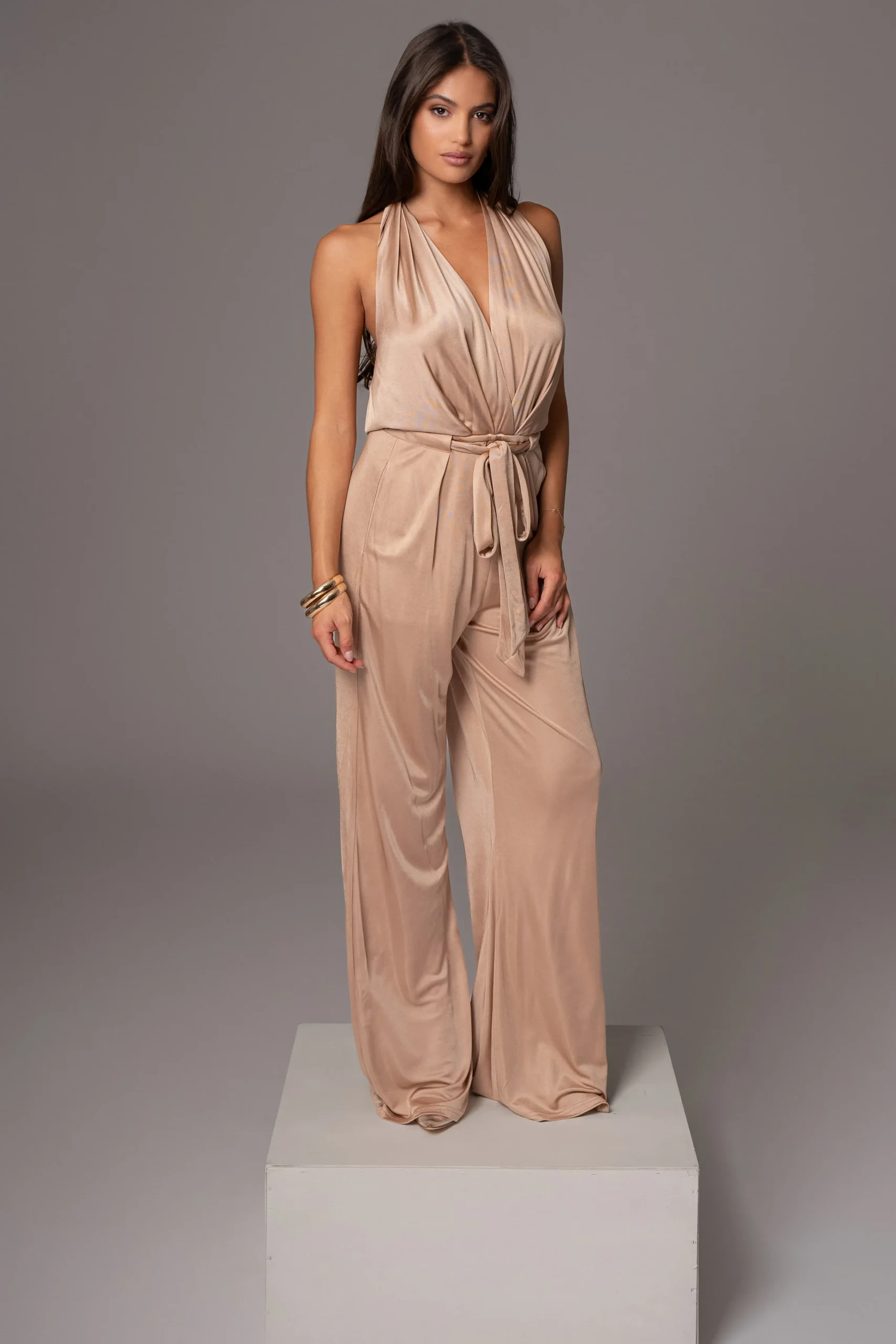 beige_slinky_halter_belte_5.webp JLUXLABEL Beige Slinky Halter Belted Jumpsuit