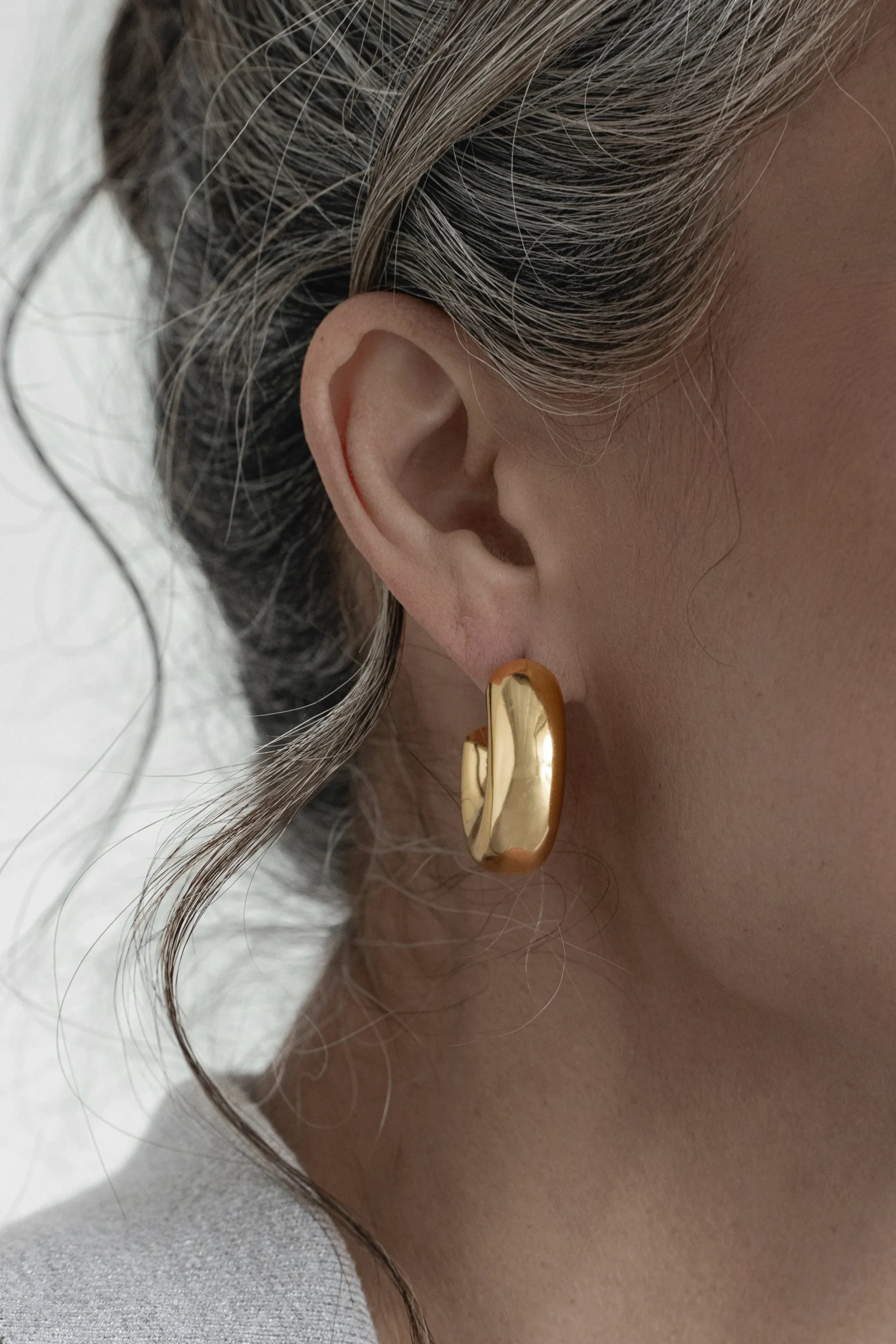 gold_caris_mini_hoop_earr_0.webp JLUXLABEL Gold Caris Mini Hoop Earrings